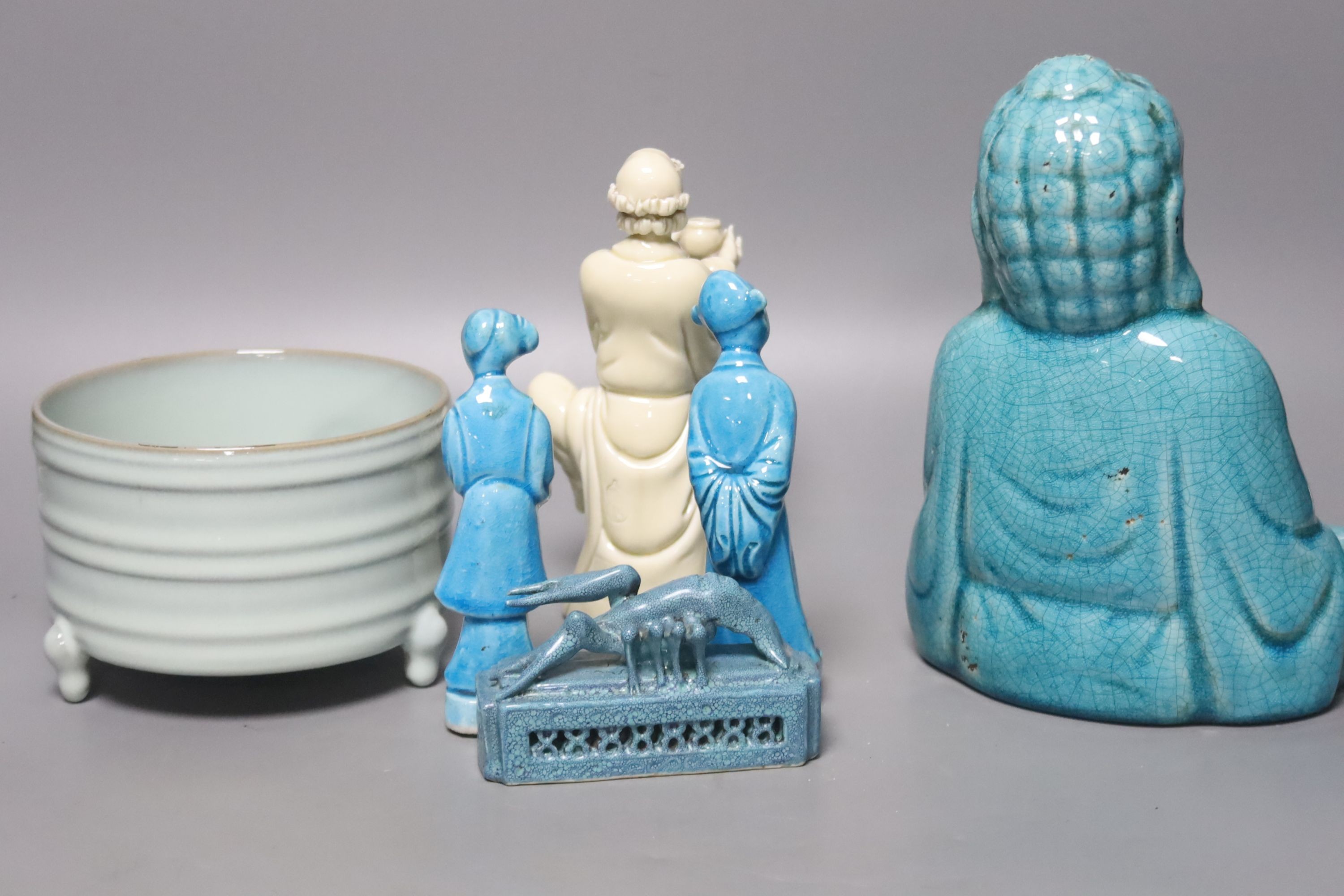 A Chinese turquoise glazed Buddha, height 21cm, a pair of figurines, a robin’s egg glazed model of a lobster, and a tripod censer